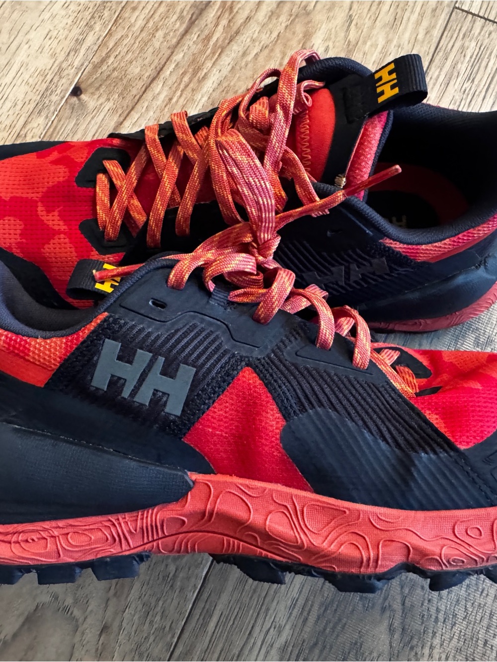 Helly Hansen Black and Red/Orange Outdoor Shoe with Yellow Accents